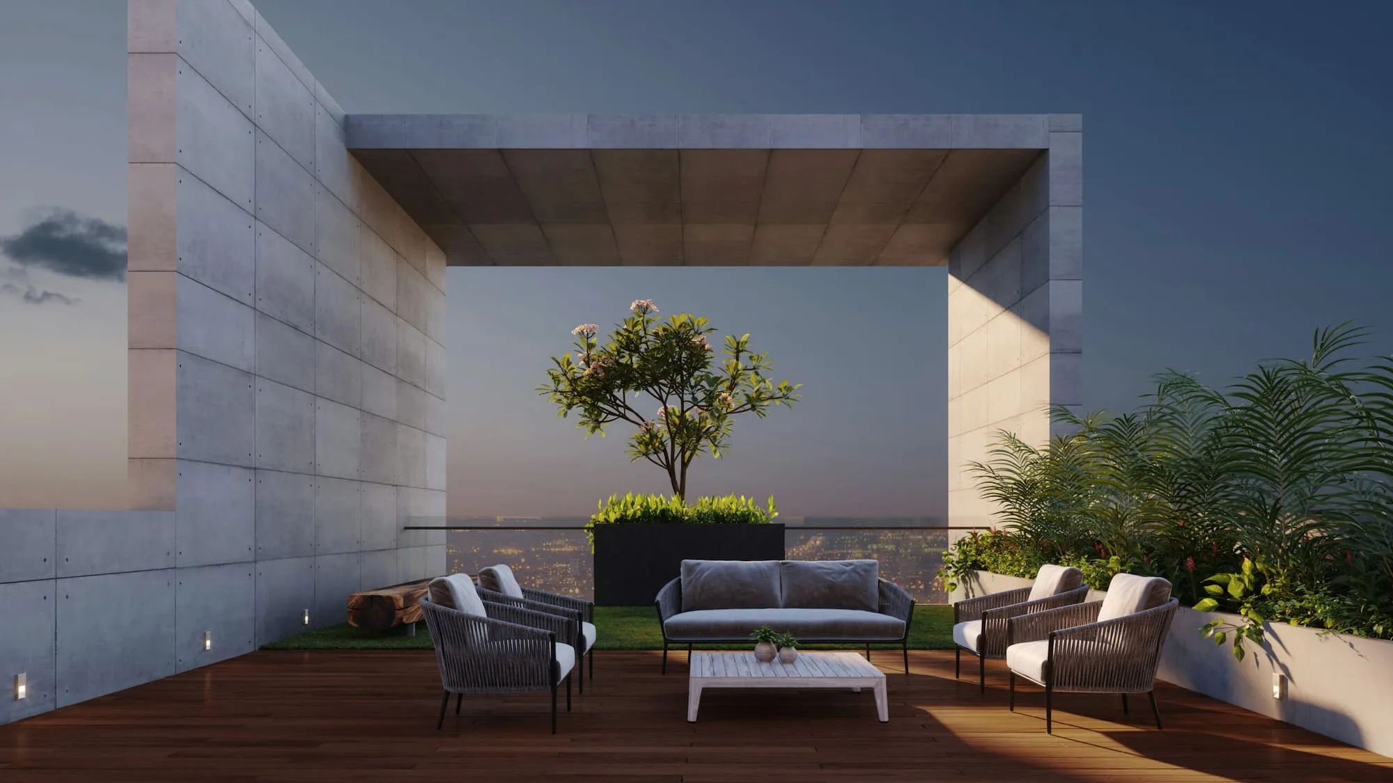 Roof terrace with outdoor sofas, a small tree and a deep concrete frame