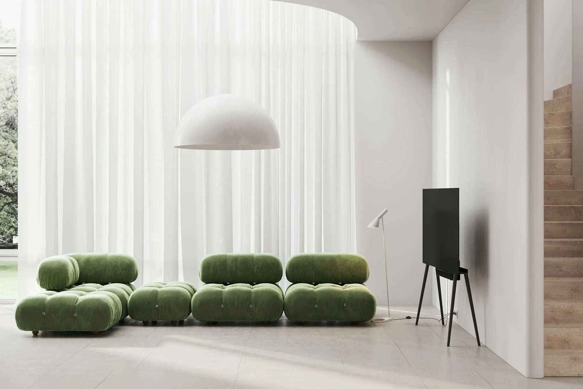 Soft green modular sofa under a white pendant, with sheer curtains